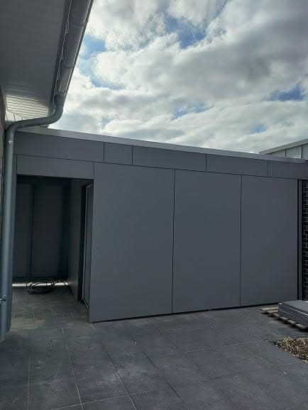 Carport mit HPL-Fassade – Carports